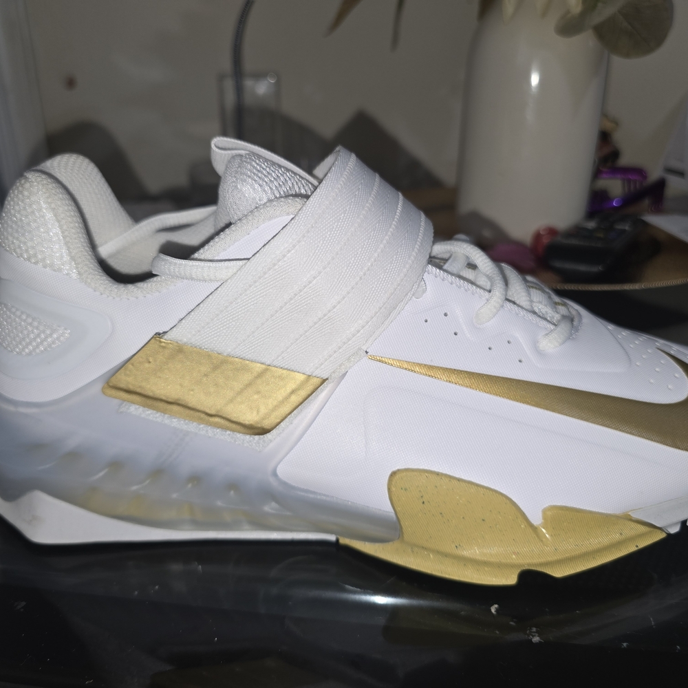 Nike White and Gold Athletic Shoes